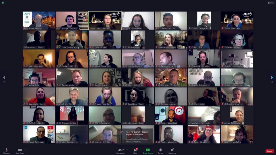 A video call grid showing dozens of participants of a JCI Blind Date