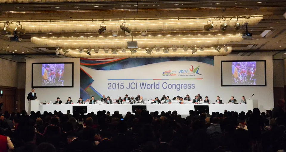 A wide view of the 2015 JCI World Congress hall with the head table on stage